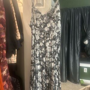 Size 18 black with flower print strap dress . Very flattering
